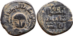 Artuqid State (1102-1409) Bronze coin. Obverse: Male figure seated facing with legs crossed Reverse: Arabic inscription

26mm 11,08g