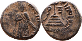 al-Malik ibn Marwan (687-705) Follis. Obverse: Standing caliph Reverse: Modified cross potent set on steps

16mm 3,29g