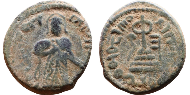 al-Malik ibn Marwan (687-705) Follis. Obverse: Standing caliph Reverse: Modified...