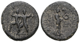 PISIDIA. Etenna. Ae (1st century BC).
Obv: Two men running left, holding curved knives.
Rev: ET - EN.
Nymph advancing right, head left, holding coiled...