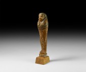Egyptian Wooden Shabti
New Kingdom, 1550-1070 BC. A wooden Ptah-Sokar-Osiris figure with square base, painted detailing to the face, tripartite wig, ...