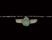 Egyptian Winged Scarab Necklace
Late Period, 664-332 BC. A restrung necklace of mainly blue glazed composition annular and tubular beads, intersperse...
