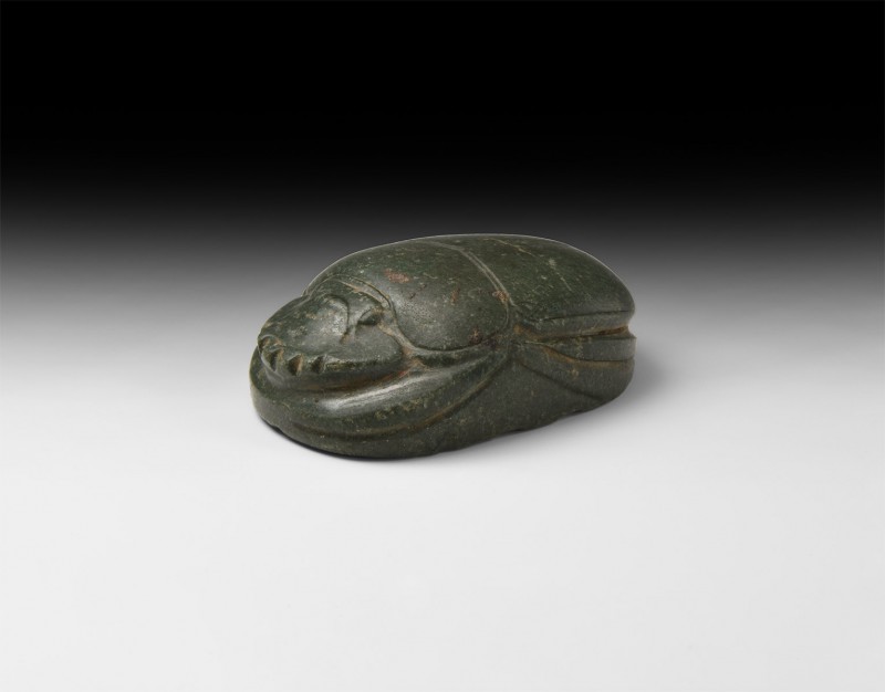 Large Egyptian Carved Stone Scarab
New Kingdom, 1550-1070 BC. A large carved gr...