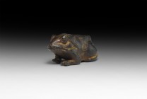 Egyptian Bronze Frog Weight
New Kingdom, 1550-1070 BC. A bronze figurine of a squatting frog with extended forelegs. Cf. Andrews, C. Amulets of Ancie...