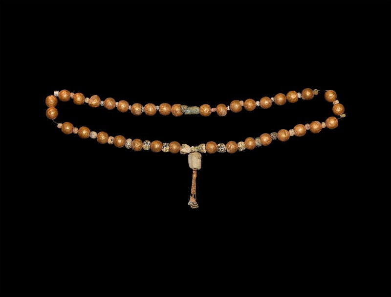 Phoenician Gold and Glass Bead String
1st millennium BC and later. A restrung n...