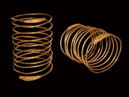 Greek Gold Coiled Snake Bracelet
5th-3rd century BC. A substantial gold bracelet formed as a rod in ten coils, finials each formed as a hatched beast...