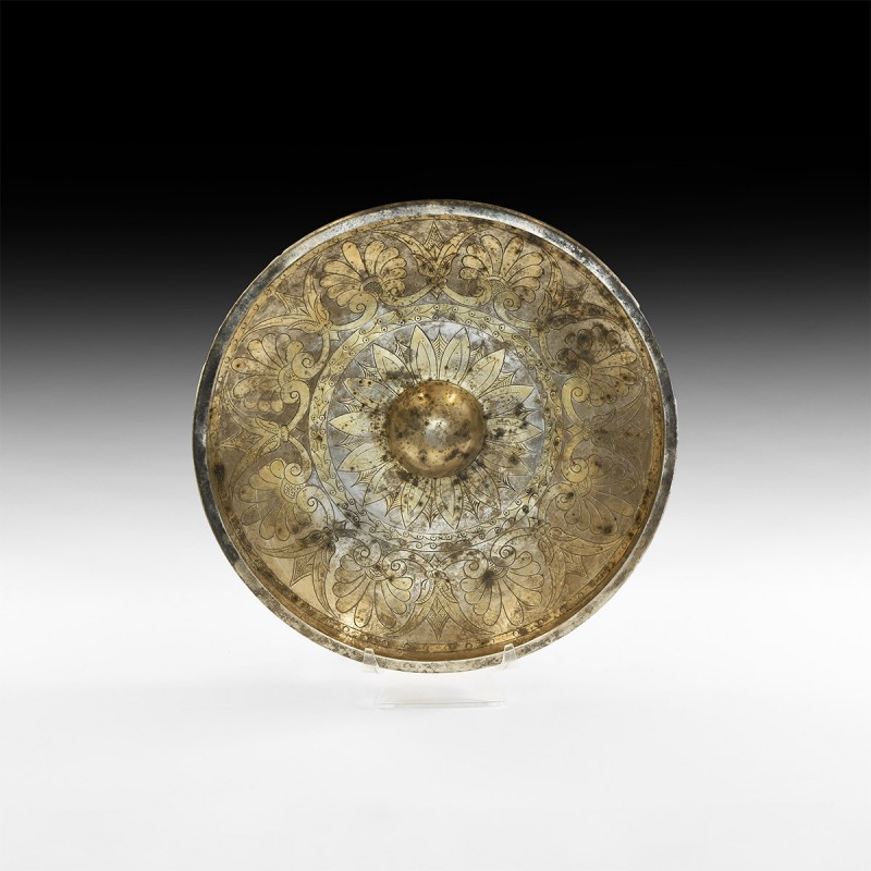 Parthian Gilt Silver Phiale Mesomphalos
2nd-1st century BC. A parcel-gilt silve...