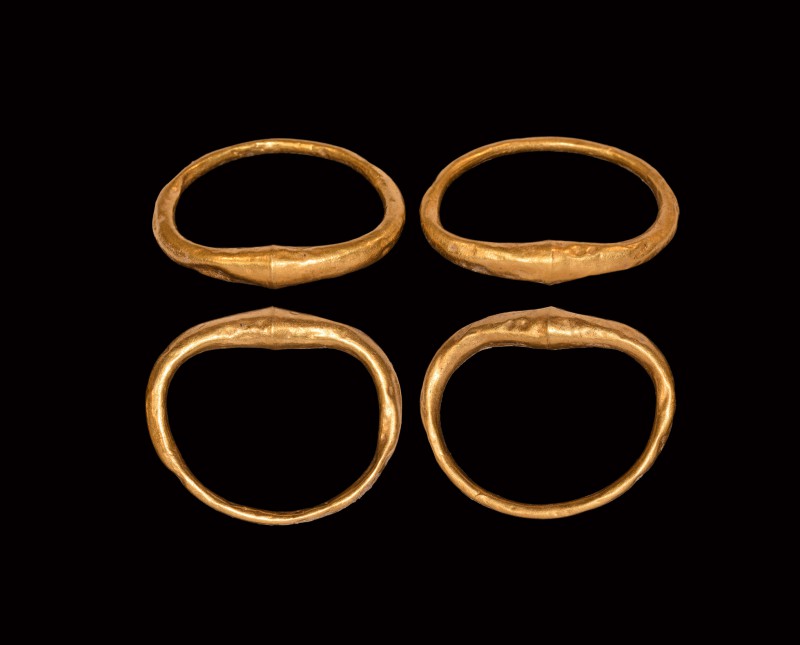 Parthian Gold Bracelet Pair
1st-2nd century AD. A matching pair of hollow-form ...