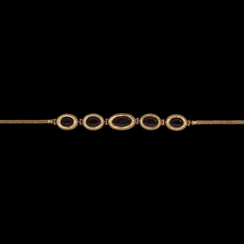 Sarmatian Gold Necklace with Garnets
1st century BC-1st century AD. A fine roun...