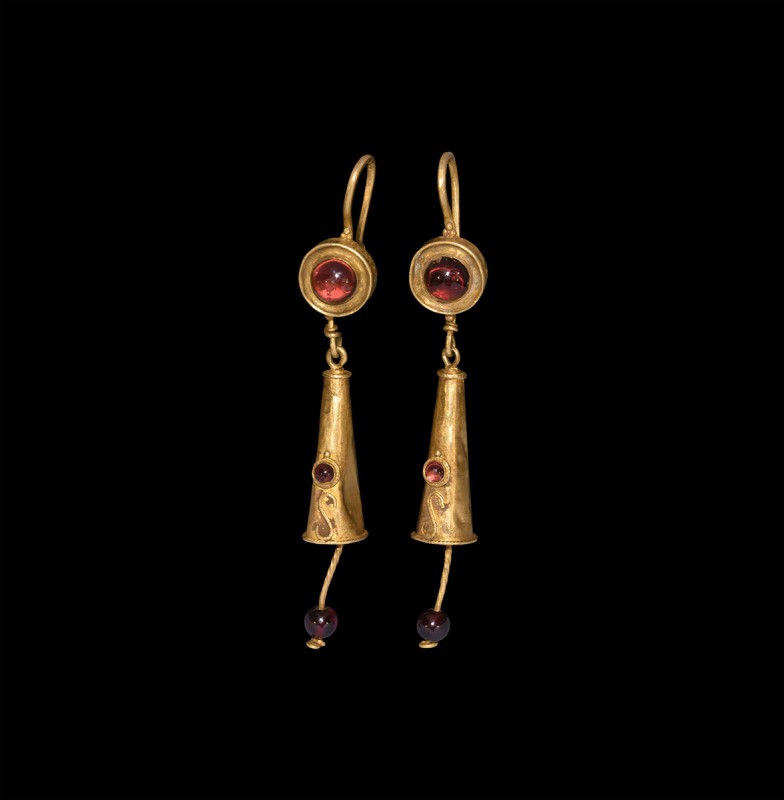 Parthian Gold Earring Pair
1st-2nd century AD. A matching pair of gold earrings...