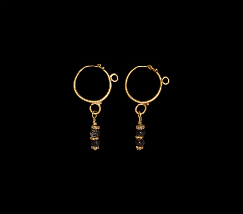 Large Parthian Gold Earring Pair
3rd century BC-2nd century AD. A matched pair ...
