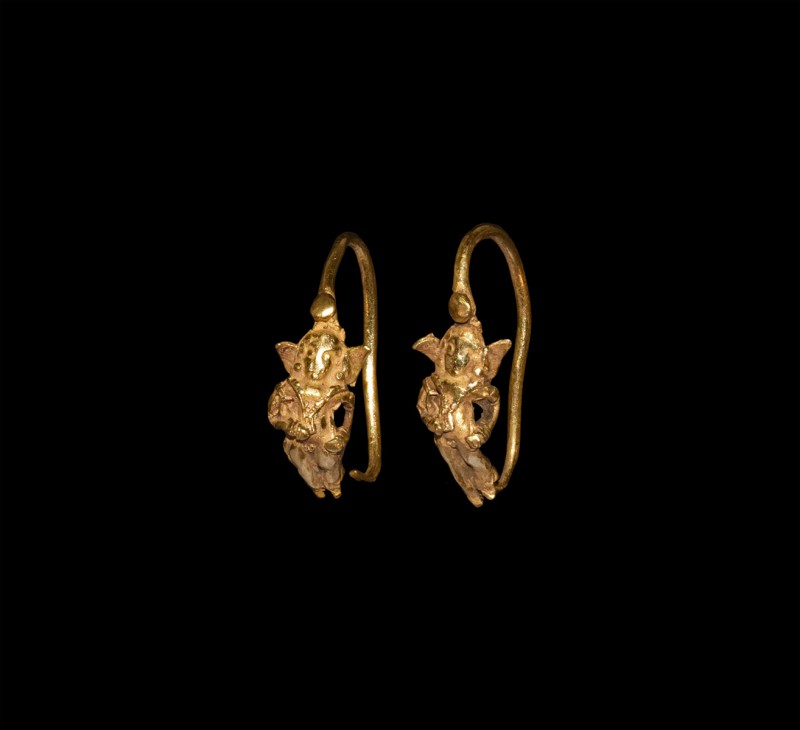 Greek Gold Astarte Earrings
5th century BC. A matched pair of gold figural earr...
