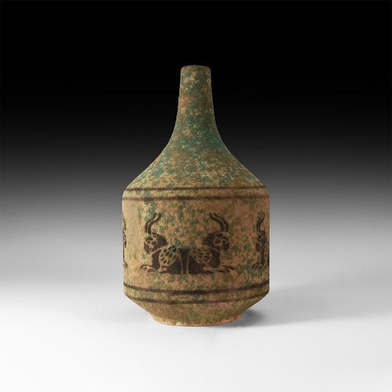 Greek Glazed Vessel with Animals
5th-3rd century BC. A ceramic drum-shaped vess...