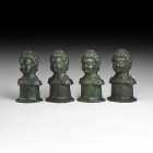 Roman Military Chariot Mount Set
4th century AD. A matched group of four Constantinian hollow-formed bronze figural chariot fittings, each a youthful...