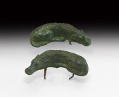 Large Roman Hunting Hound Chariot Mount Pair
1st century BC-1st century AD. A pair of hollow-formed bronze chariot mounts of hunting dogs, each with ...