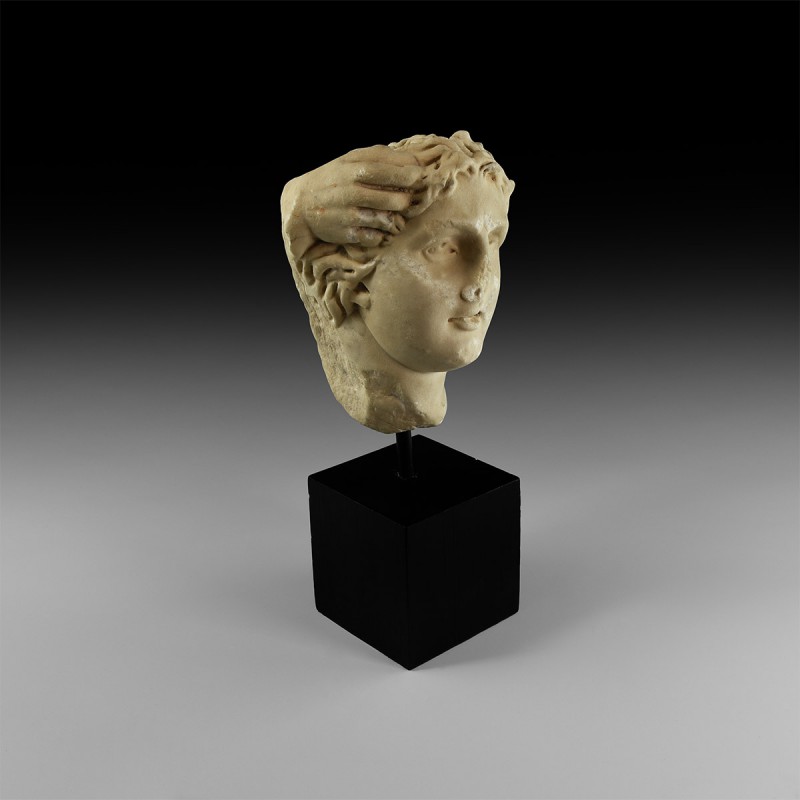 Roman Marble Head of a Young Man
2nd-3rd century AD. A carved marble head of a ...