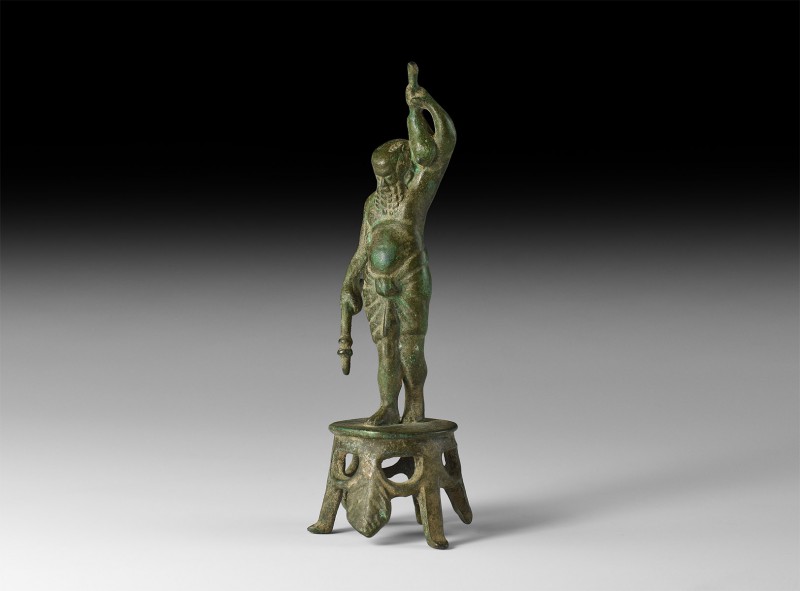 Roman Silenus Statuette
1st-2nd century AD. A bronze statue of bearded Silenus ...