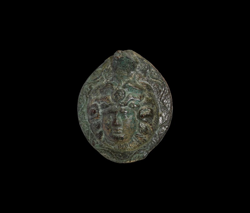 Roman Medusa Phalera
1st century BC-2nd century AD. A domed bronze discoid phal...