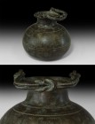 Large Roman Situla with Hercules Knot
1st-3rd century AD. A bronze situla with bulbous body decorated with slender bands of wheel-cut decoration, the...