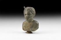 Roman African Boy Balsamarium
1st-2nd century AD. A bronze balsamarium in the form of the bust of an African boy, bands of curly hair to the head; yo...