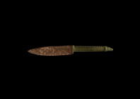 Roman Wolf-Handled Knife
1st century BC-1st century AD. A knife with single-edged iron blade, leaf-shaped flared bronze baluster, grip with ropework ...