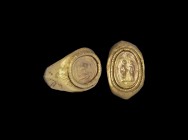 Roman Gold Figural Marriage Ring
2nd-4th century AD. A gold ring with inset intaglio representing two opposing figures, a married couple holding hand...