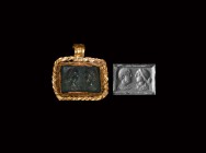 Roman Gold Marriage Pendant with Facing Busts Gemstone
1st-2nd century AD. A rectangular pendant with crimped flange border and ribbed loop, inset gr...