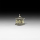 Roman Gilt Silver Lidded Pyxis
2nd-3rd century AD. A parcel-gilt silver pyxis with band of gilt discs to the sidewall depicting deities and their sym...