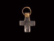 Byzantine Gold and Rock Crystal Cross Pendant
7th-9th century AD. A cross pendant comprising a thick equal-armed rock crystal cross, gold foil finial...