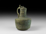 Byzantine Handled Vessel with Warrior Saints
6th-9th century AD. A substantial bronze ewer with drum-shaped body, broad shoulder, wide neck and cap w...