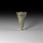 Byzantine Iridescent Glass Lamp
5th-8th century AD. A conical iridescent glass lamp with circumferential ribbing, slightly everted rim. 92.3 grams, 1...