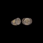 Byzantine Gilt Silver Ring with Monogram
14th-15th century AD. A silver-gilt finger ring with discoid bezel and hatched bands to the shoulders, beade...
