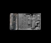 Western Asiatic Old Babylonian Cylinder Seal with Presentation Scene
16th-19th century BC. A haematite cylinder seal with a king with a mace facing a...