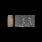 Western Asiatic Graeco-Babylonian Cylinder Seal with Fighting Scene
4th century BC. A white agate cylinder seal with warrior on the right with a roun...