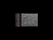 Western Asiatic Anatolian Cylinder Seal with Worship Scene
19th-16th century BC. A carved haematite cylinder seal with figures and animals; accompani...