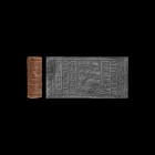Western Asiatic Kassite Cylinder Seal with a Worshipper in Front of an Enthroned God
1500-1155 BC. A mottled limestone cylinder seal with a bearded g...