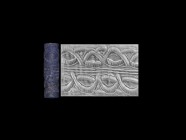 Western Asiatic Late Akkadian Cylinder Seal with Two Registers
22nd-20th century BC. A lapis lazuli cylinder seal with geometric design; accompanied ...