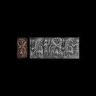Western Asiatic Syro-Cappadocian Cylinder Seal with Contest Scene
19th-18th century BC. A chert cylinder seal with two scenes that determine the pict...