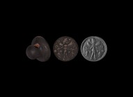 Western Asiatic Sumerian Stamp Seal with God Anu
3rd-2nd millennium BC. A discoid schist(?) stamp seal with pierced knop handle, intaglio profile ima...