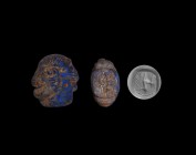 Western Asiatic Lapis Lazuli Double-Faced Stamp Seal
3rd-2nd millennium BC. A carved lapis lazuli stamp seal depicting a janiform beast head, engrave...