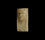Western Asiatic South Arabian Inscribed Stele
2nd century BC-1st century AD. A rectangular limestone stele with carved male face of a dignitary and t...