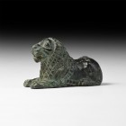 Western Asiatic Lion Statuette
5th-4th century BC. A bronze figurine of a reclining lion with erect head and extended forepaws, tail curled to the si...