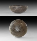 Western Asiatic Late Achaemenid Silver Lotus Bowl
4th-3rd century BC. A sheet-silver hemispherical bowl with chamfered rim, lotus-petal detailing to ...