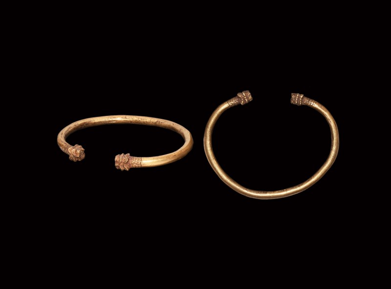 Western Asiatic Gold Bracelet with Lion Head Terminals
1st millennium AD. A gol...