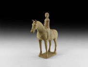 Chinese Tang Horse and Rider
Tang Dynasty, 618-906 AD. A ceramic figurine of a horse and rider, the horse standing, appearing alert with its ears poi...