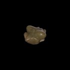 Chinese Song Carved Frog Amulet
Song Dynasty, 13th century AD. A carved jade(?) figure of a frog modelled in the round. 38 grams, 40mm (1/2"). Proper...