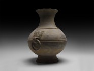 Chinese Han Hu Jar with Handles
Han Dynasty, 206 BC-220 AD. A large ceramic bicolour vessel with pear-shaped bulbous body with flared base, tall neck...