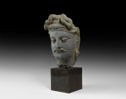 Life-Size Gandharan Buddha Statue Head
1st-4th century AD. A finely detailed carved schist head of Buddha with detailed carefully dressed hair, clean...