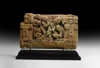 Gandharan Figural Frieze Section with Ascetic Buddha
4th-5th century AD. A carved stone frieze fragment depicting two rectangular columns with foliag...