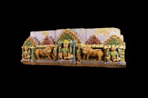 Indian Painted Figural Frieze with Lions
18th-19th century AD. A carved stone frieze depicting figures seated in the lotus position flanked by female...